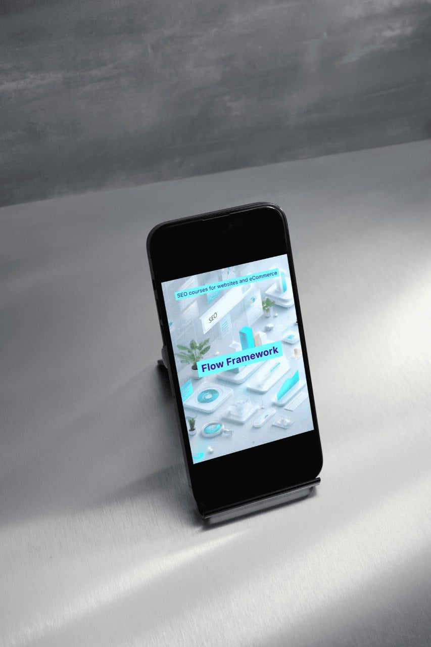Smartphone on a stand displaying a digital product with 'Flow Framework' text on a gray background