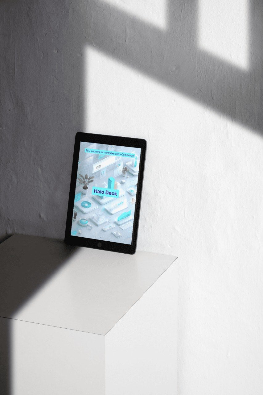 Tablet on a white surface with a digital interface displayed on the screen.